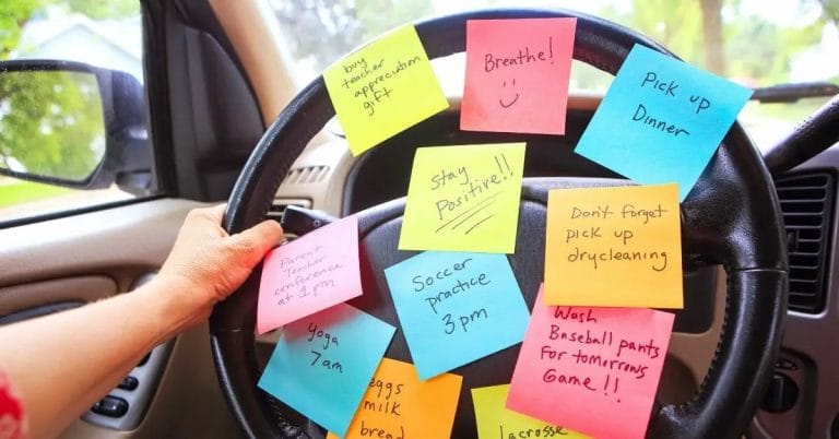 a list of tasks that can be done within a short time written on post-it notes pasted on a driving wheel